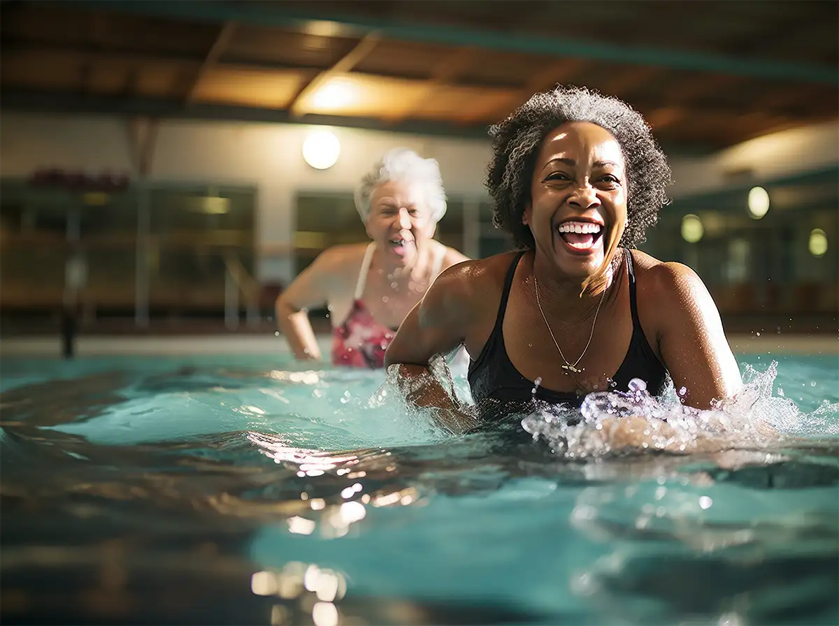 Diverse group of senior women in a water aerobics class - Collinsville, IL - Bethalto, IL